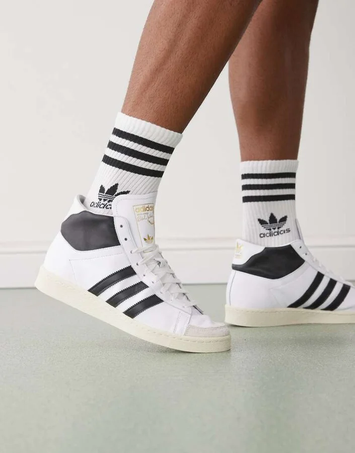 adidas Originals Jabbar high top sneakers in white and black