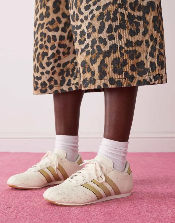 adidas Originals Taekwondo sneakers in off white and gold