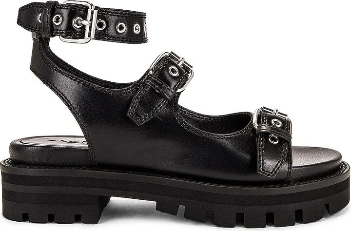 ALAÏA Buckle Sandals in Black