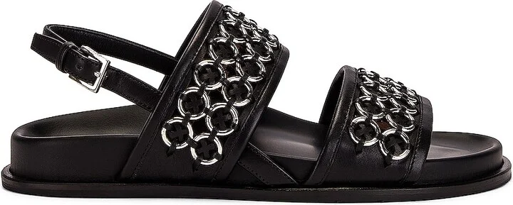 ALAÏA Eyelet Slingback Sandals in Black