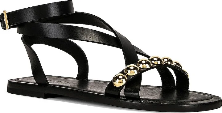 ALAÏA Flat Ankle Strap Sandals in Black - Image 2