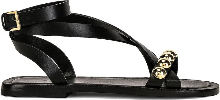 ALAÏA Flat Ankle Strap Sandals in Black