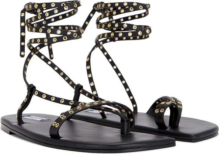 ALAÏA Flat Strappy Sandal in Black