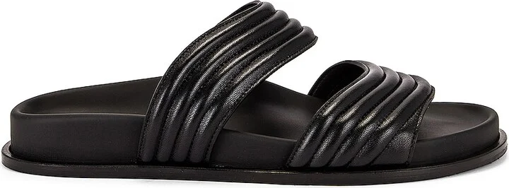 ALAÏA Leather Slides in Black