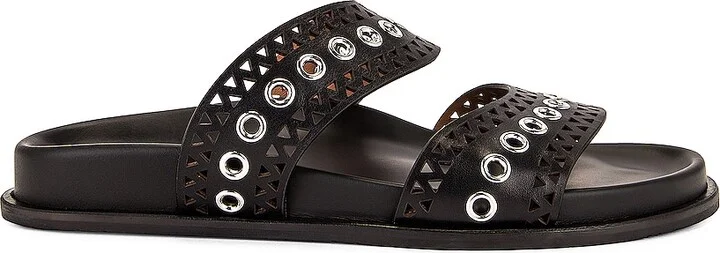 ALAÏA Perforated Eyelet Slides in Black