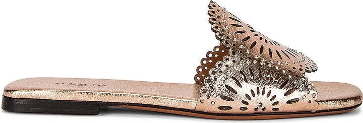 ALAÏA Perforated Molukai Mules in Metallic Gold