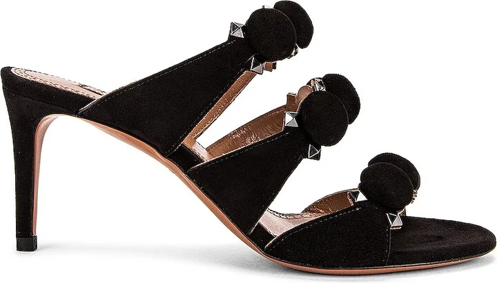 ALAÏA Pom Pom Studded Mules in Black