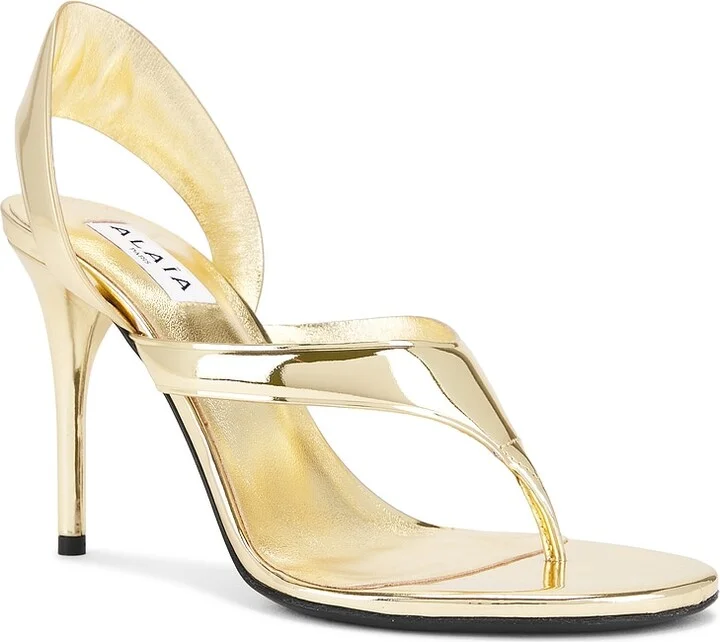 ALAÏA Thong Sandal in Metallic Gold - Image 2