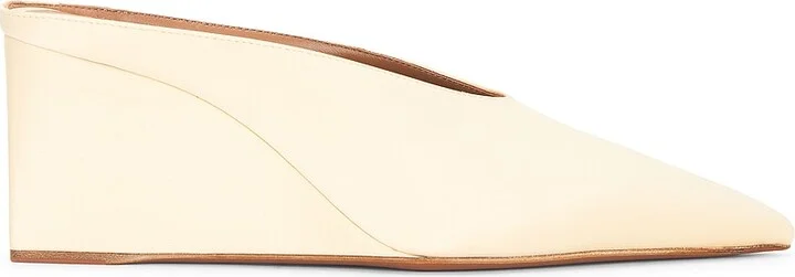 ALAÏA Wedge Mule in Cream