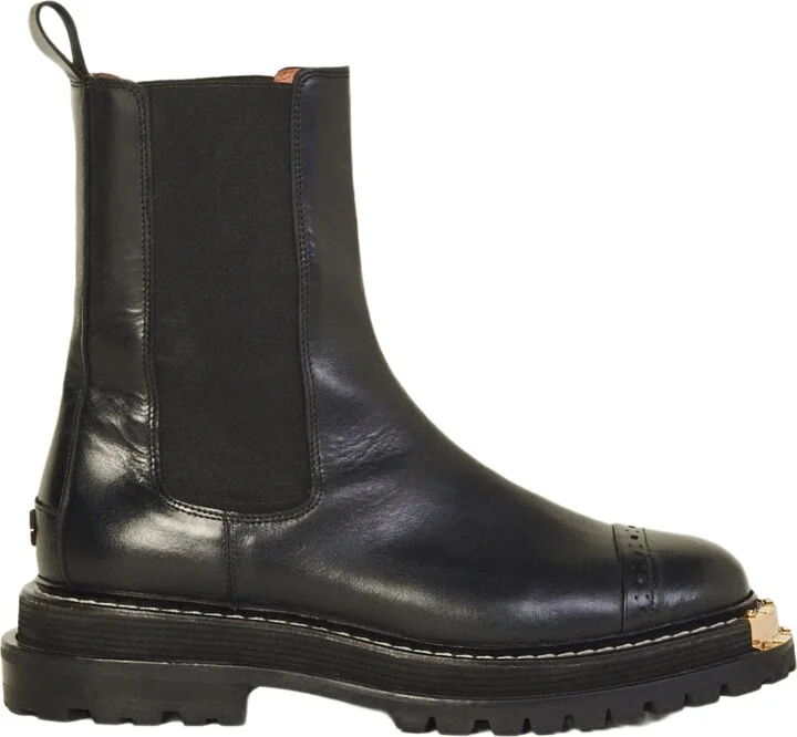 Ankle boots with notched sole