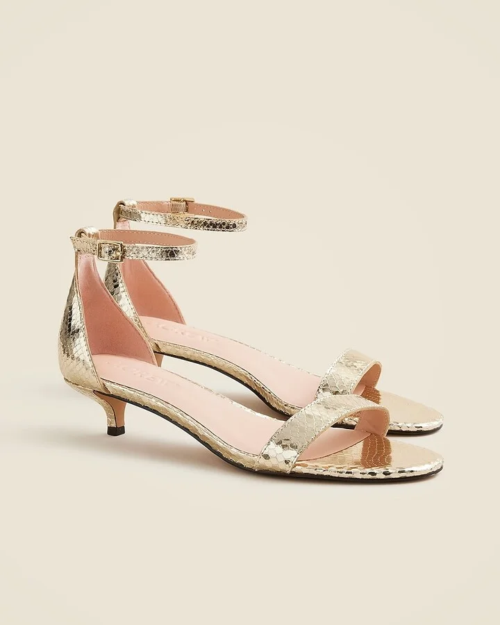 Ankle-strap kitten-heel sandals in Italian snake-embossed metallic leather