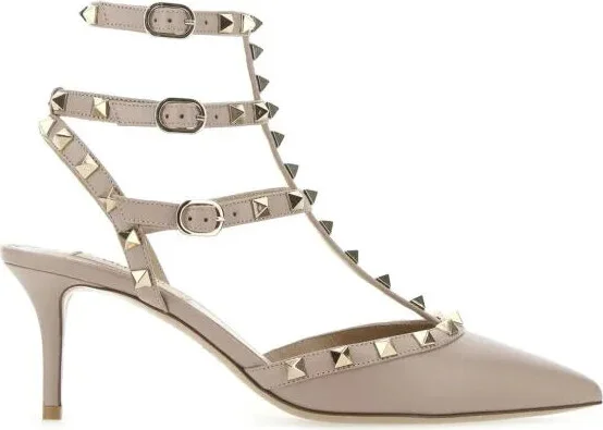 Antiqued pink leather Rockstud pumps
