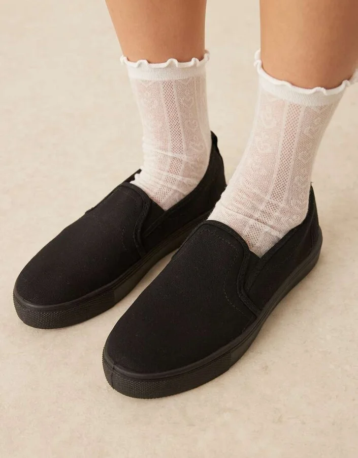 ASOS DESIGN Dotty slip on sneakers in black - Image 4