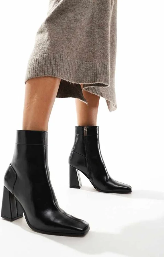 ASOS DESIGN Everest flared heel boots in black