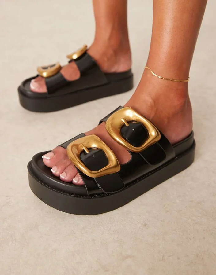 ASOS DESIGN Femi oversized buckle footbed mules in black