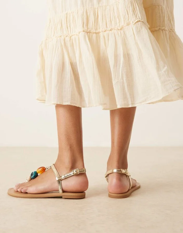ASOS DESIGN Feud toe post flat sandals with stones in gold - Image 4