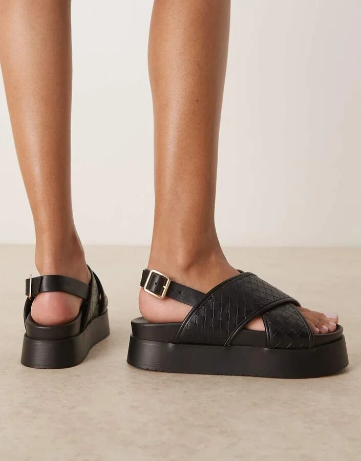 ASOS DESIGN Flame woven cross strap footbed sandals in black