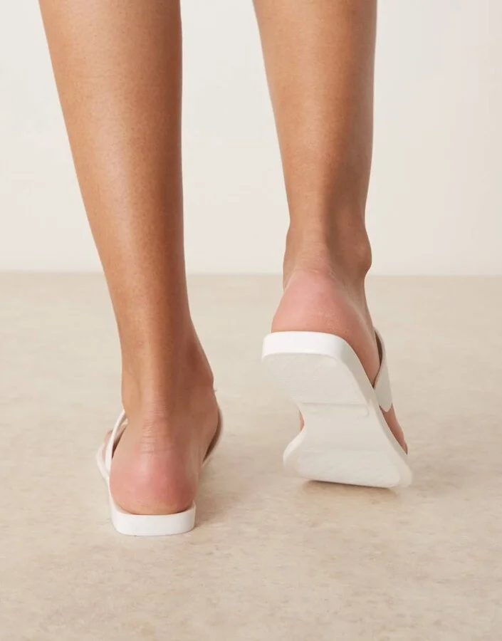 ASOS DESIGN Flatter metal coin jelly flip flop sandals in white - Image 4