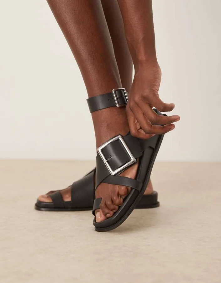 ASOS DESIGN Flawless leather toe loop footbed sandals in black