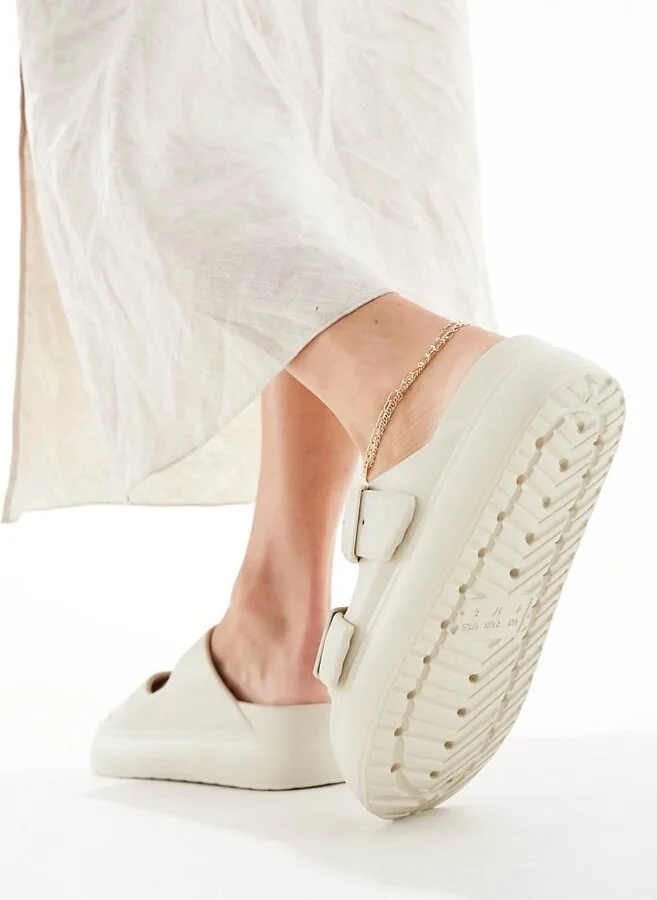 ASOS DESIGN Freestyle flatform double buckle footbed slides in beige - Image 3