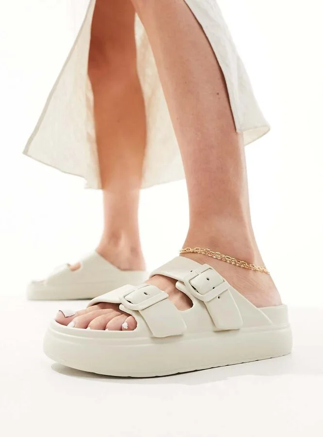 ASOS DESIGN Freestyle flatform double buckle footbed slides in beige - Image 4