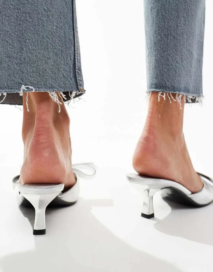 ASOS DESIGN Hyphen bow detail mid heeled mules in silver - Image 4
