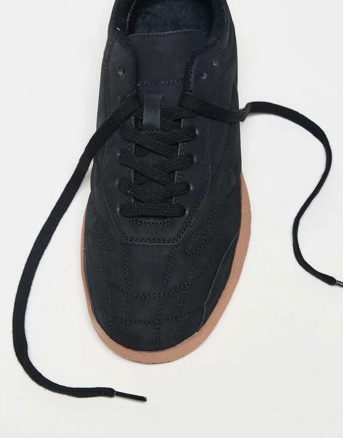 ASOS DESIGN lace up sneakers in black with off white stitching - Image 4