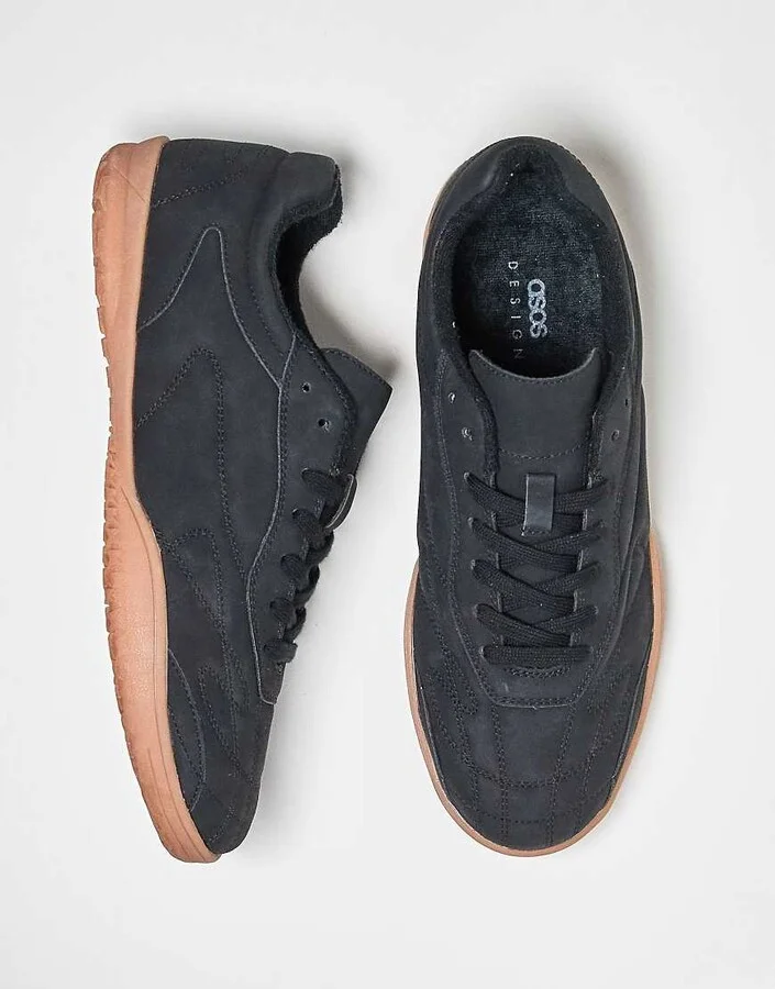 ASOS DESIGN lace up sneakers in black with off white stitching