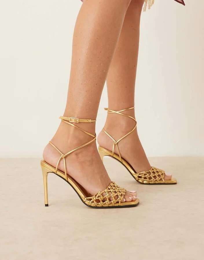 ASOS DESIGN Nadine knotted high heeled sandals in gold