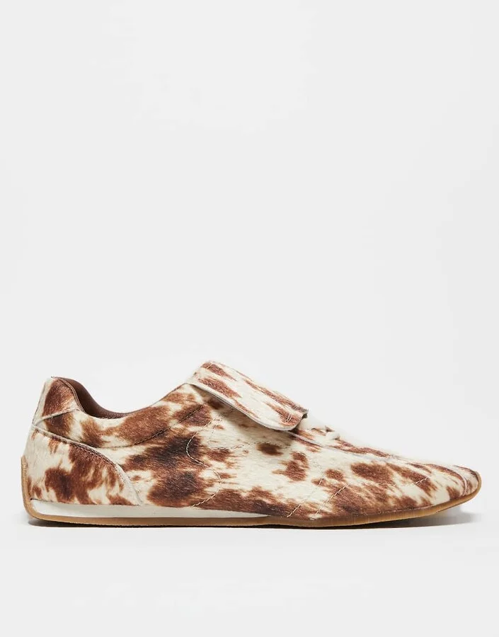 ASOS DESIGN retro sneakers in faux pony print with oversized tongue