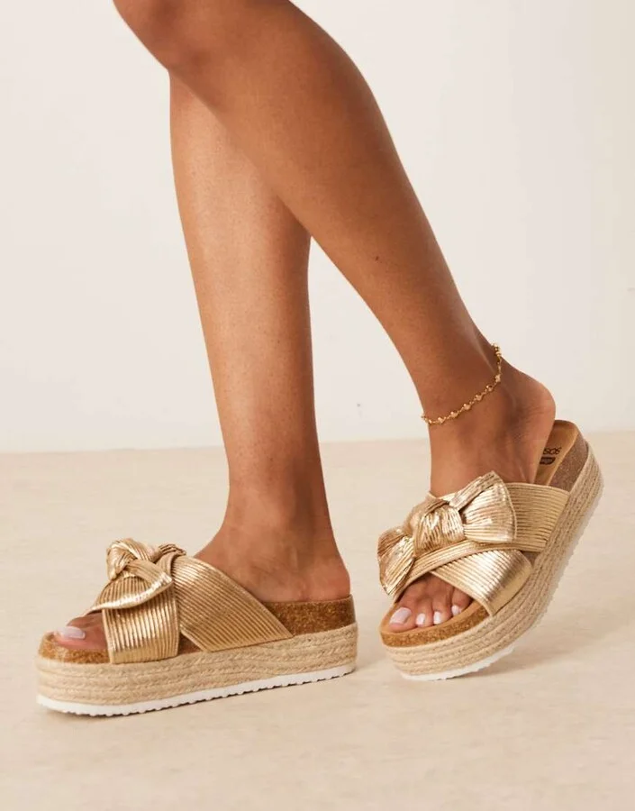 ASOS DESIGN Thankful bow detail flatform sandals in gold