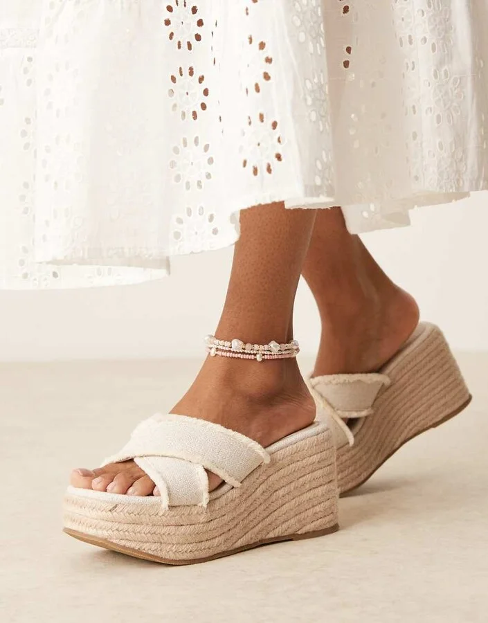 ASOS DESIGN Twirl cross strap wedges in natural