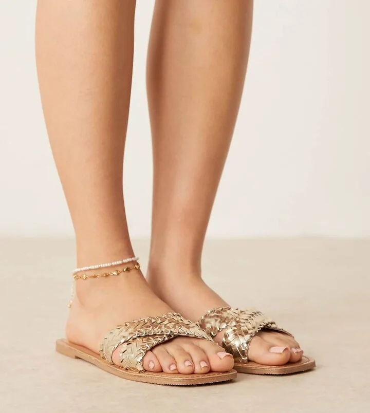 ASOS DESIGN Wide Fit Flossie woven flat sandals in gold