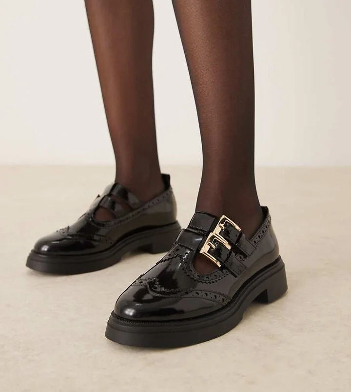ASOS DESIGN Wide Fit Marigold chunky buckle detail flat shoes in black