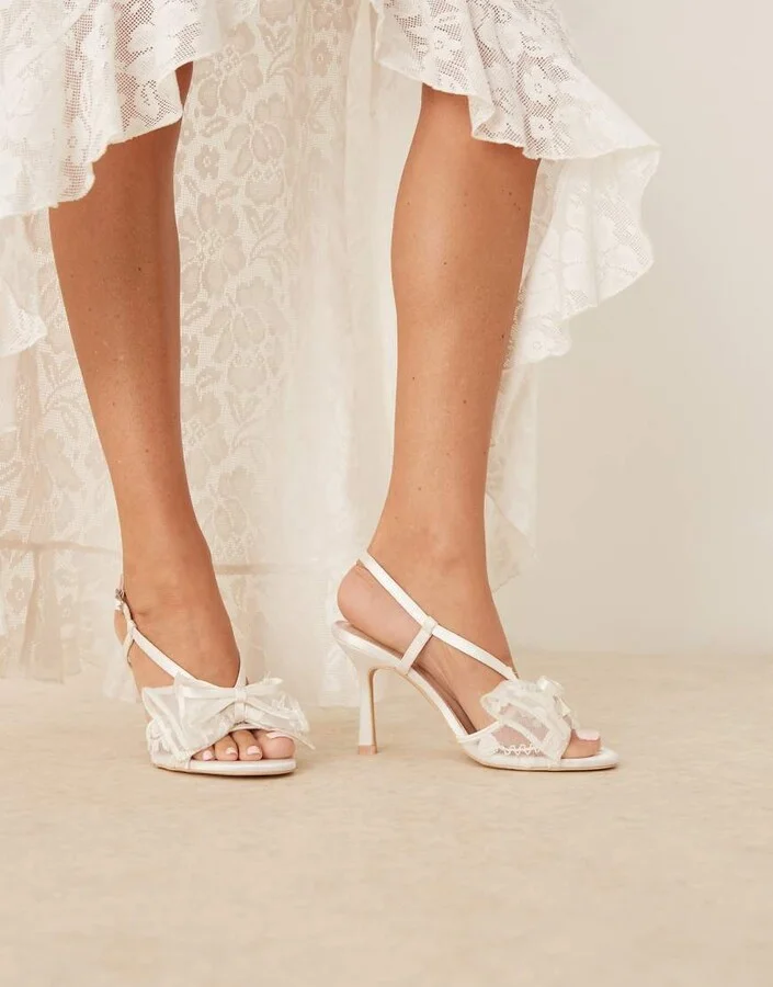 Be Mine Bridal Dove heeled sandals with lace bows in ivory
