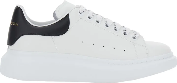 Black And White Low Top Sneakers With Logo Lettering On Tongue And Contrasting Heel In Leather Man