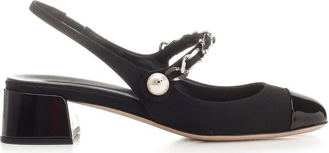 Black canvas and leather pumps