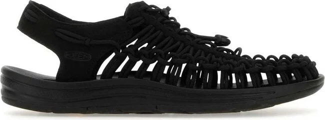 Black fabric and rubber Uneek sneakers