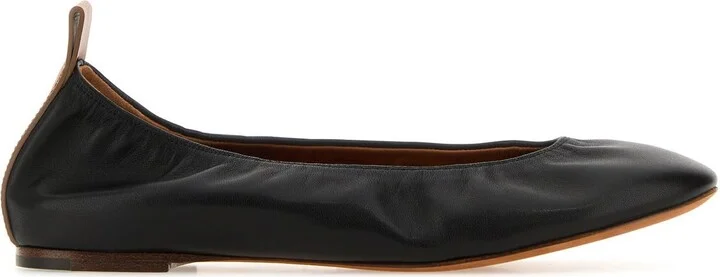 Black leather ballerinas