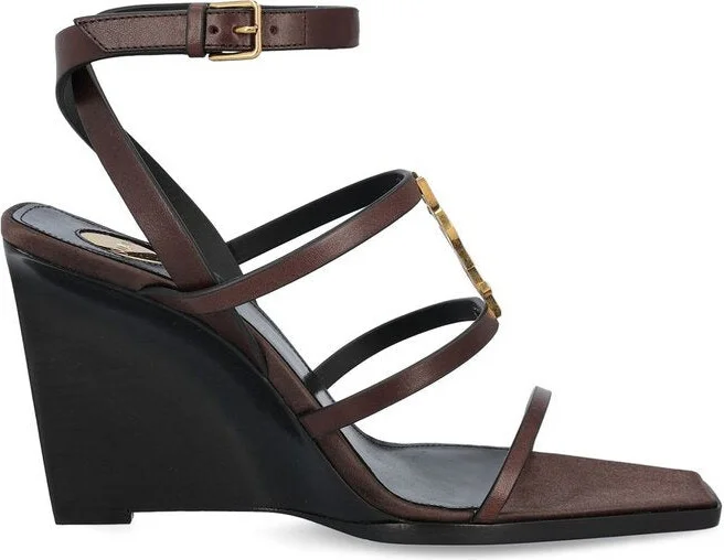 Black leather Cassandre wedges