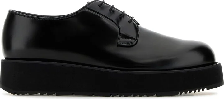 Black leather lace-up shoes