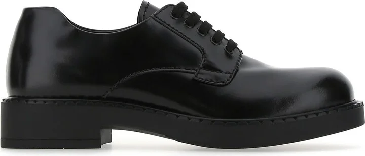 Black leather lace-up shoes