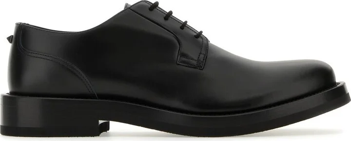 Black leather lace-up shoes