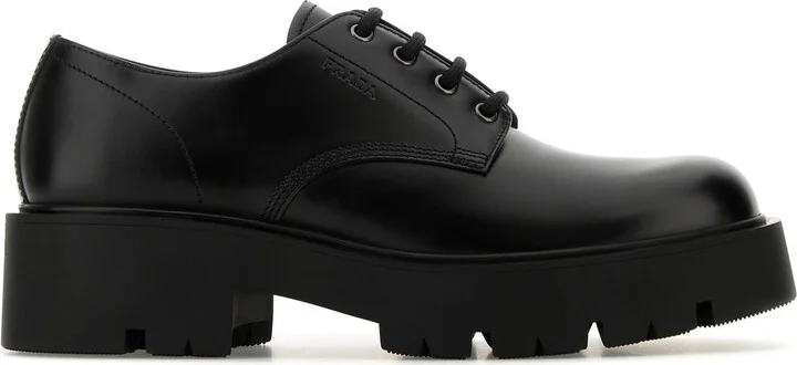 Black leather lace-up shoes