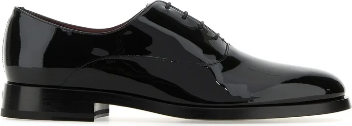 Black leather lace-up shoes