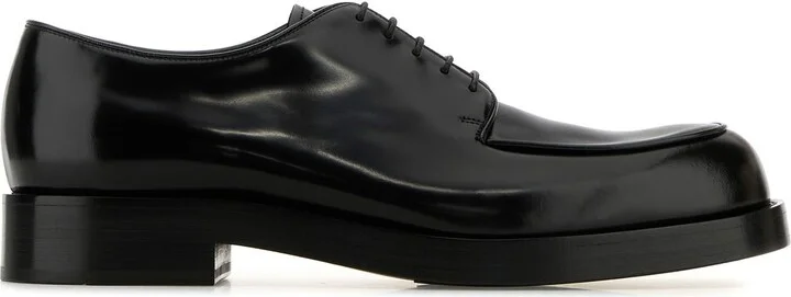 Black leather lace-up shoes
