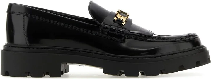 Black leather loafers