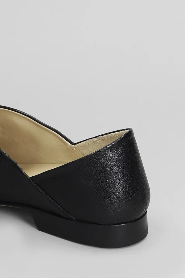 Black leather loafers