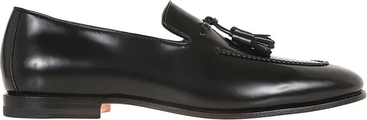 Black Leather Moccasin With Tapered Toe And Decorative Tassels