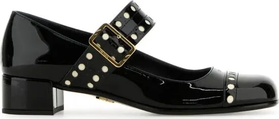 Black leather pumps